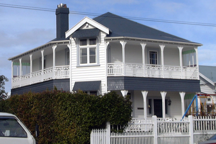 white villa with grey shingles